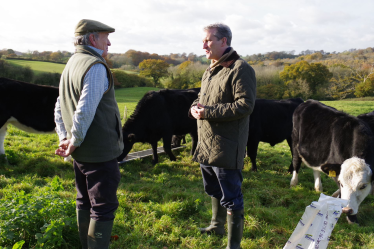 Damian with farmer